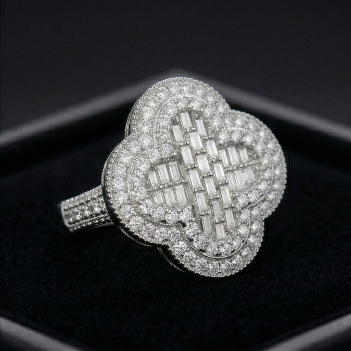 Diamond ring with intricate design on a black background