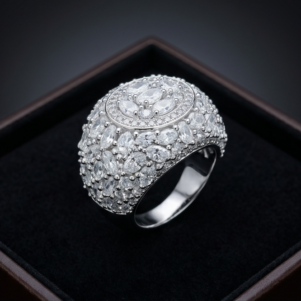 Silver ring with diamonds on a black background