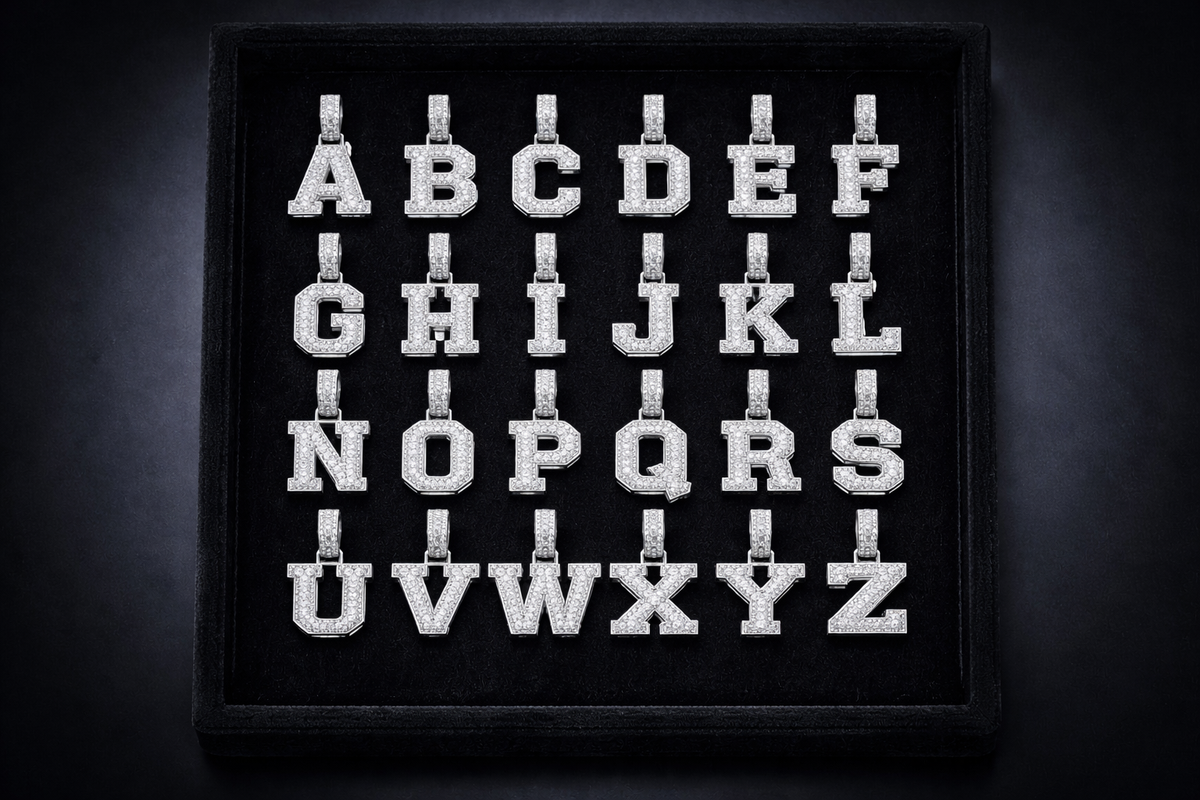 Embroidered alphabet letters on a black background
