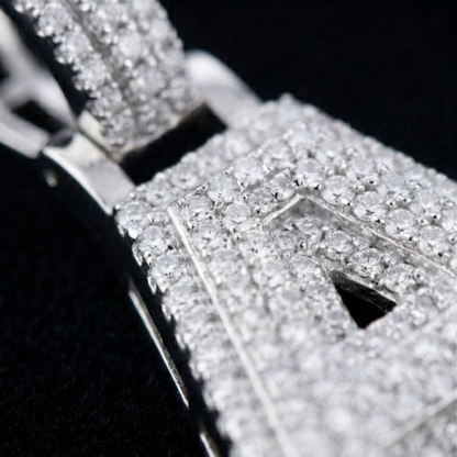 Close-up of a diamond-encrusted ring with a black background