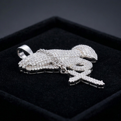 Silver lobster-shaped pendant with clear stones on a black background