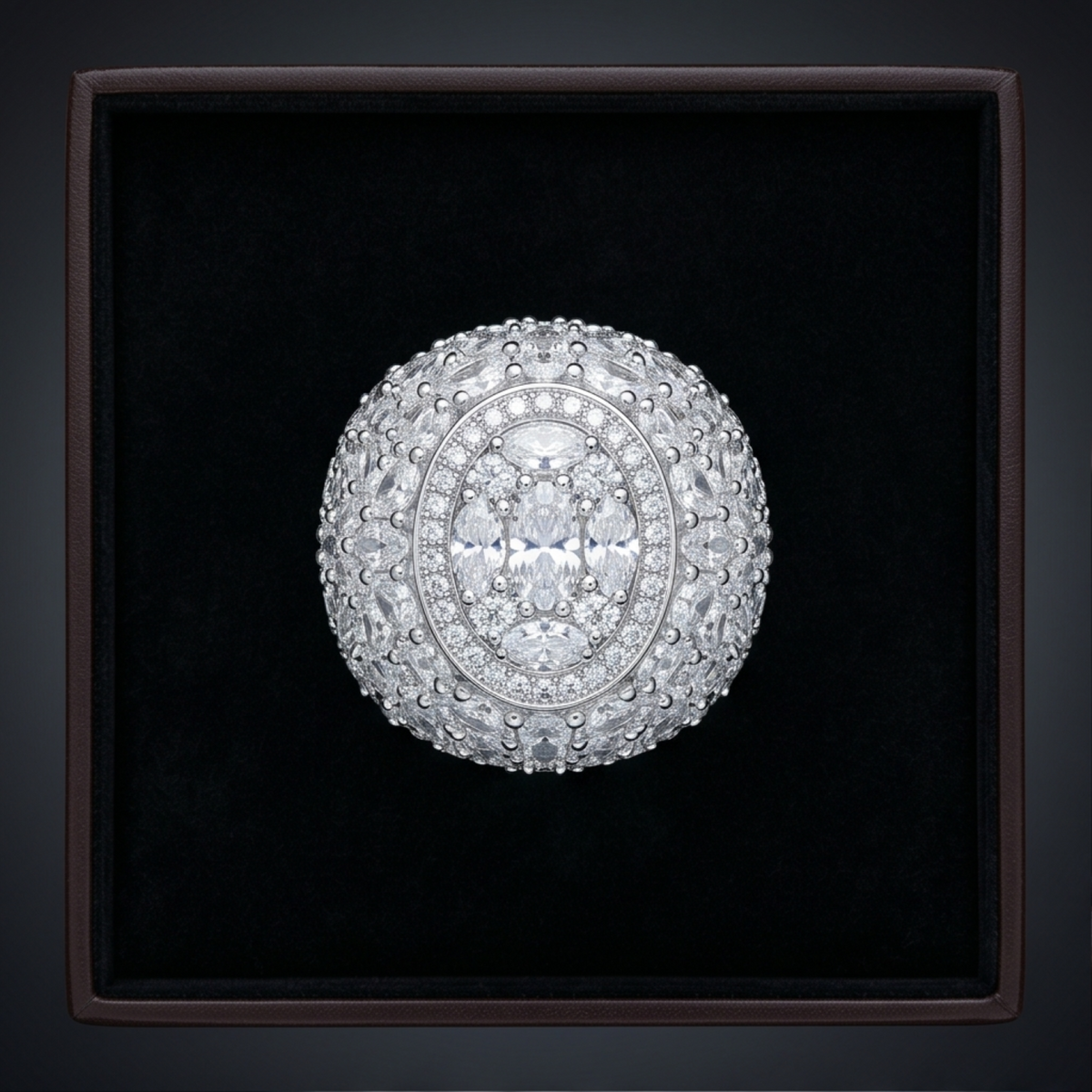 Diamond ring in a black box on a dark background