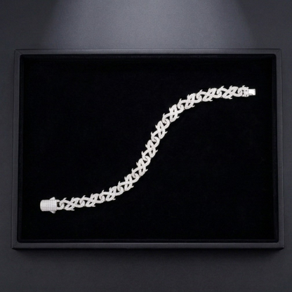 Silver bracelet on a black background