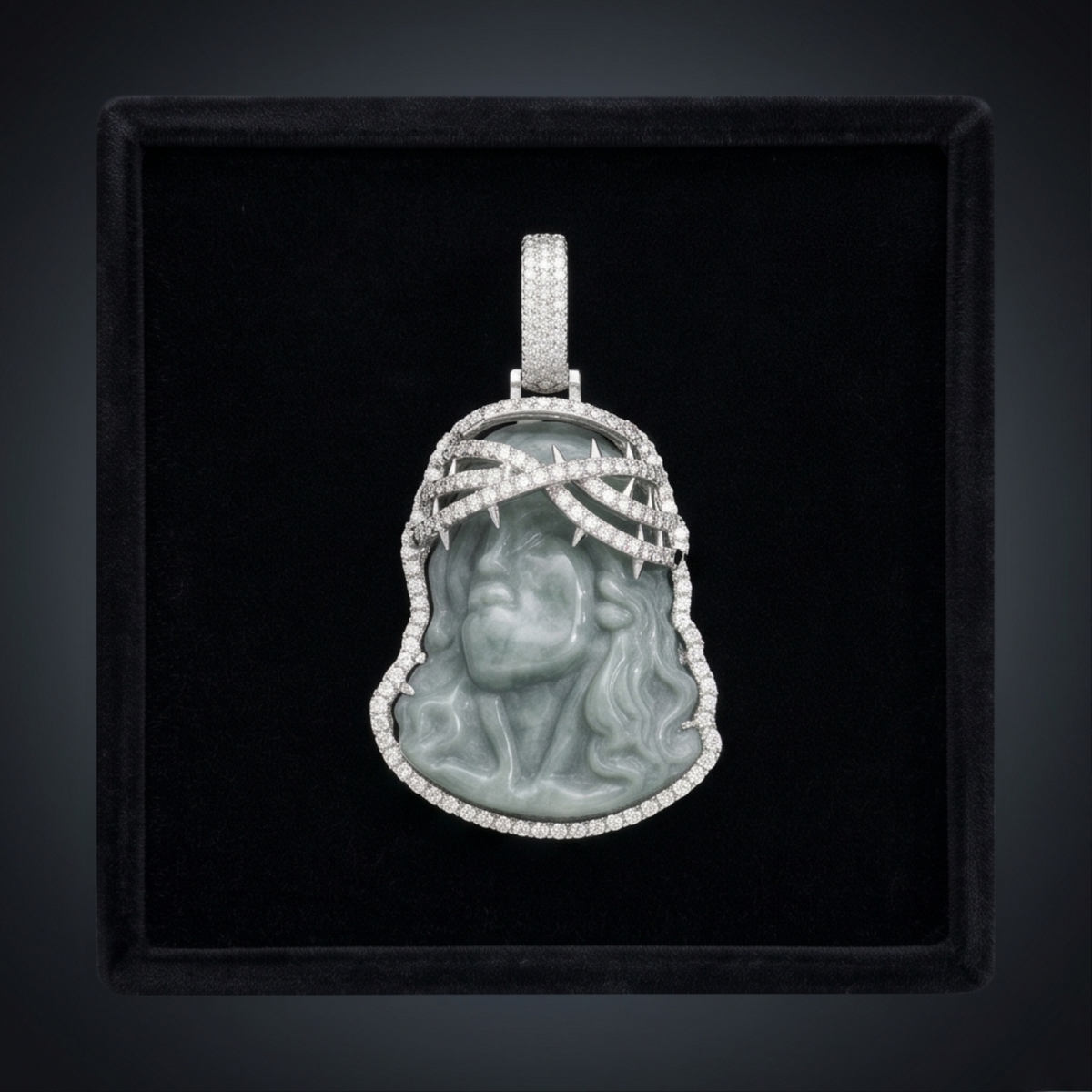Jade pendant with diamond accents on a black background